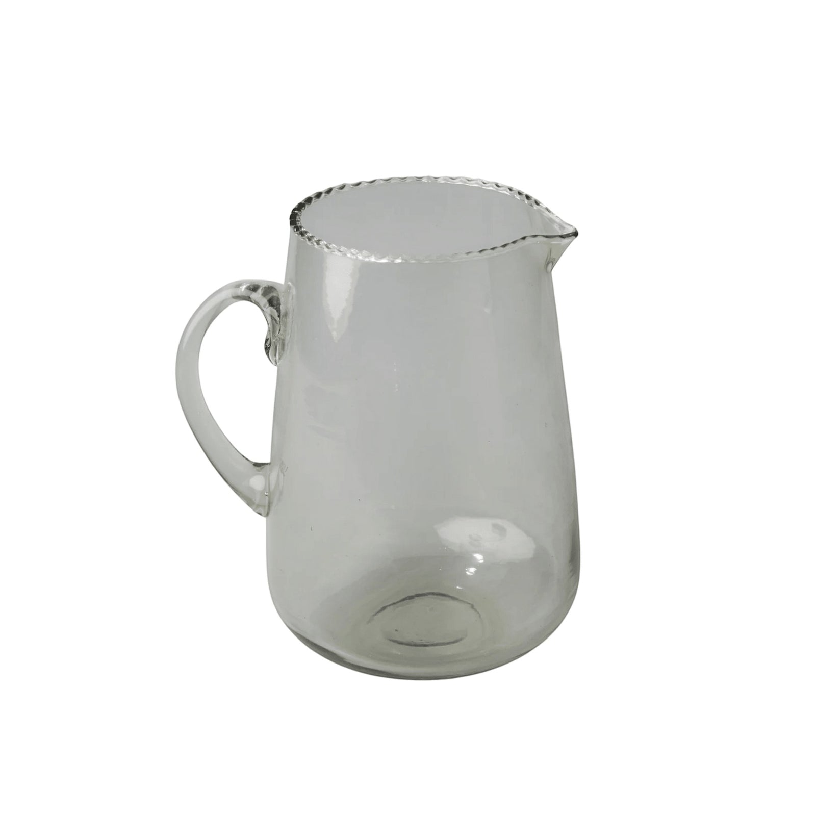 Be Home clear glass pitcher with a delicate ruffled rim and curved handle for elegant beverage serving