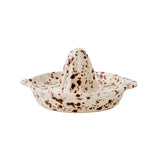 Sir Madam splatterware citrus juicer in Cacao, cream stoneware with dark brown splatter glaze, ridged cone and two side handles, on a white background.