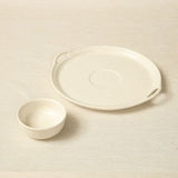 Tob Aero Indira ivory ceramic chip and dip platter set with a round serving tray and small matching bowl.