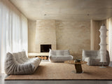 Armadillo Meadow Rug in Tamarillo, overhead view of the hand-knotted wool weave and edge finish