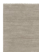 Armadillo Sagrada Rug in Dun, corner close-up of the wool pile and edge