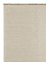 Armadillo Abbey Rug in Cane, corner close-up of the wool and jute pile and edge