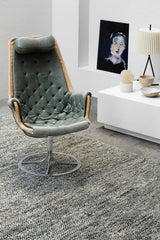 Armadillo Acacia Rug in Galapagos, a second view of the hand-knotted wool and jute rug in a styled interior