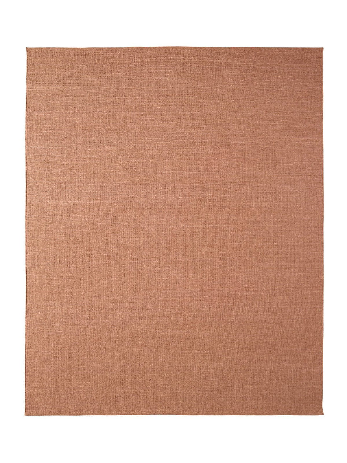 Armadillo Aerie Rug in Bellini, a second view of the handwoven flatweave rug in a styled interior