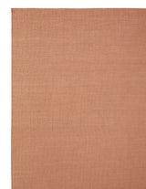 Armadillo Aerie Rug in Bellini, corner close-up of the linen, wool, and jute pile and edge