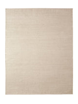 Armadillo Aerie Rug in Coconut, a second view of the handwoven flatweave rug in a styled interior