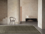 Armadillo Agra Rug in Thistle, a second view of the hand-knotted wool rug in a styled interior