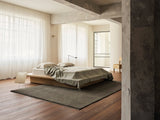 Armadillo Agra Rug in Thistle, hand-knotted wool rug shown in a room setting