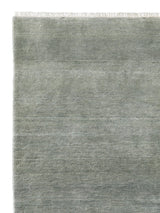 Armadillo Agra Rug in Moonstone, corner close-up of the wool pile and edge