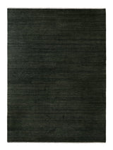 Armadillo Agra Rug in Juniper, overhead view of the hand-knotted wool weave and edge finish