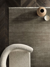 Armadillo Agra Rug in Thistle, overhead view of the hand-knotted wool weave and edge finish