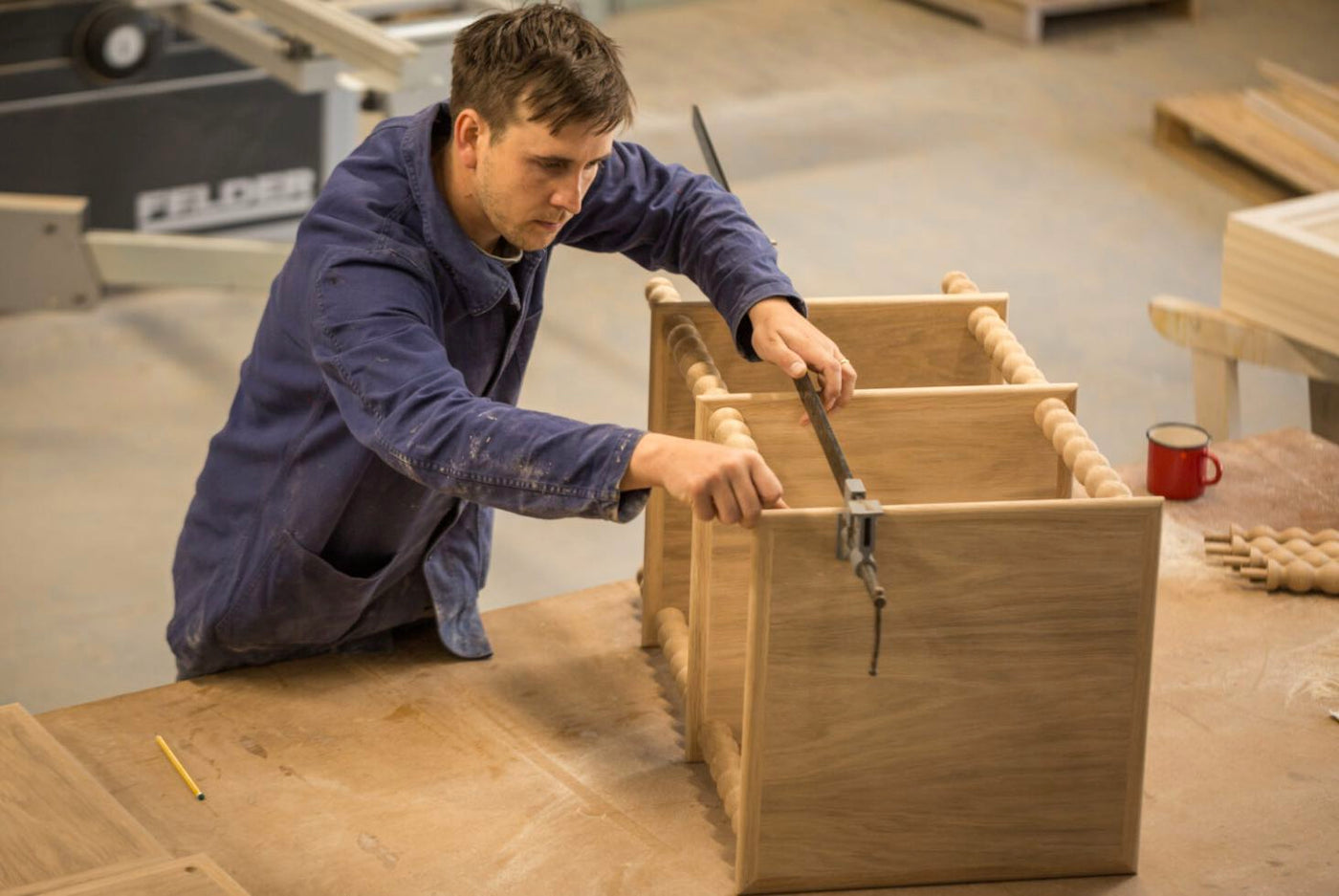 Turned by hand in English oak.