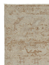 Armadillo Allegra Rug in Cinnamon, corner close-up of the wool pile and edge
