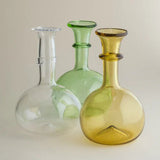 Tuscan amber glass decanter styled on a bar