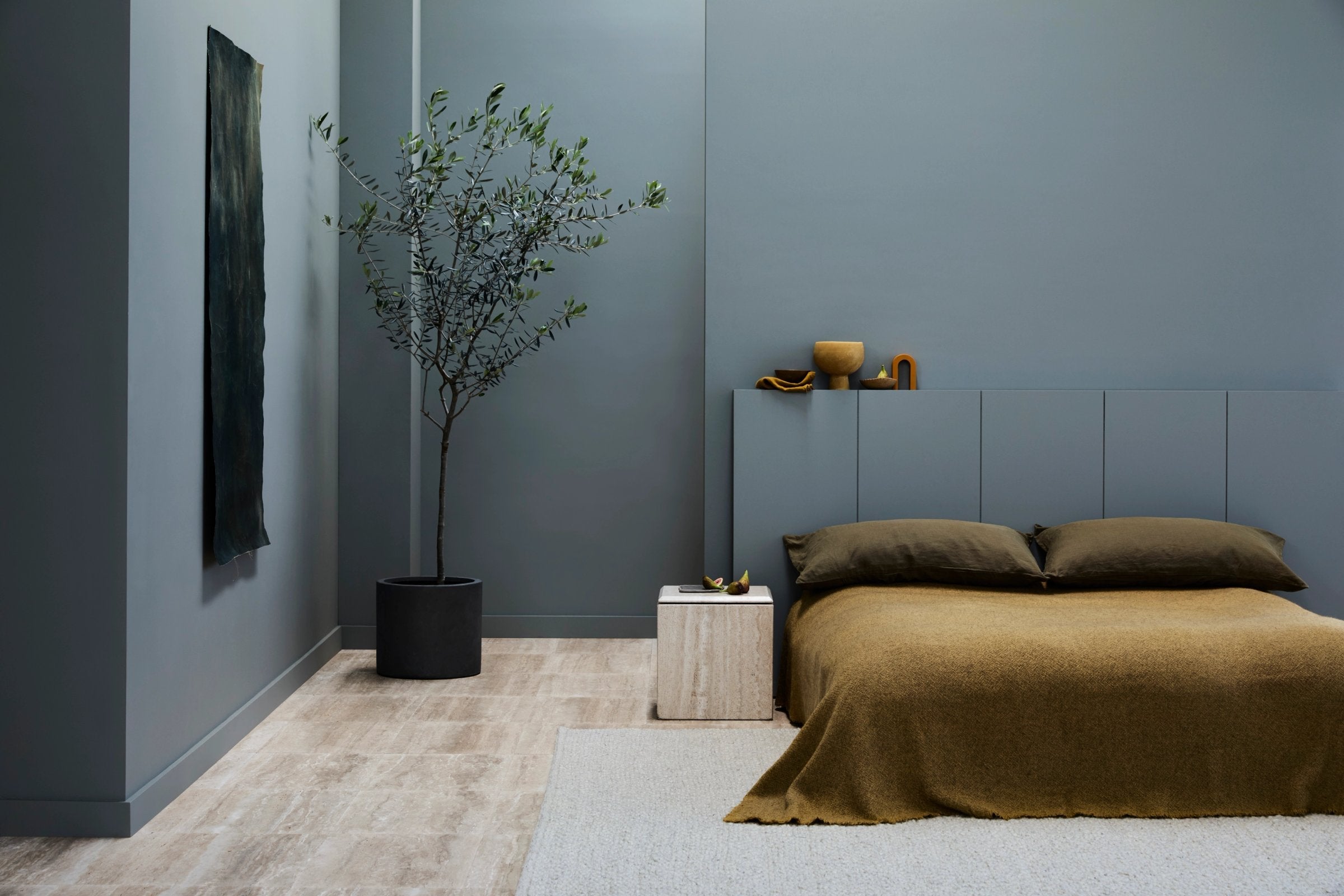 Andes Rug by Armadillo, handwoven wool flatweave rug, styled in a room at Calimia Home