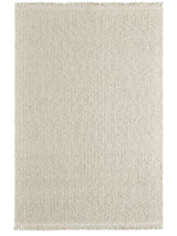 Armadillo Arroyo Rug in Chalk, a second view of the handwoven felted wool rug in a styled interior