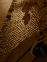 Armadillo Arroyo Rug in Sepia, overhead view of the handwoven felted wool weave and edge finish