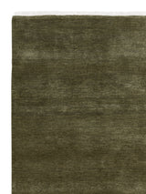 Armadillo Agra Rug in Artichoke, corner close-up of the wool pile and edge