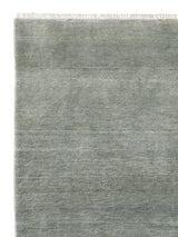 Armadillo Agra Rug in Moonstone, corner close-up of the wool pile and edge