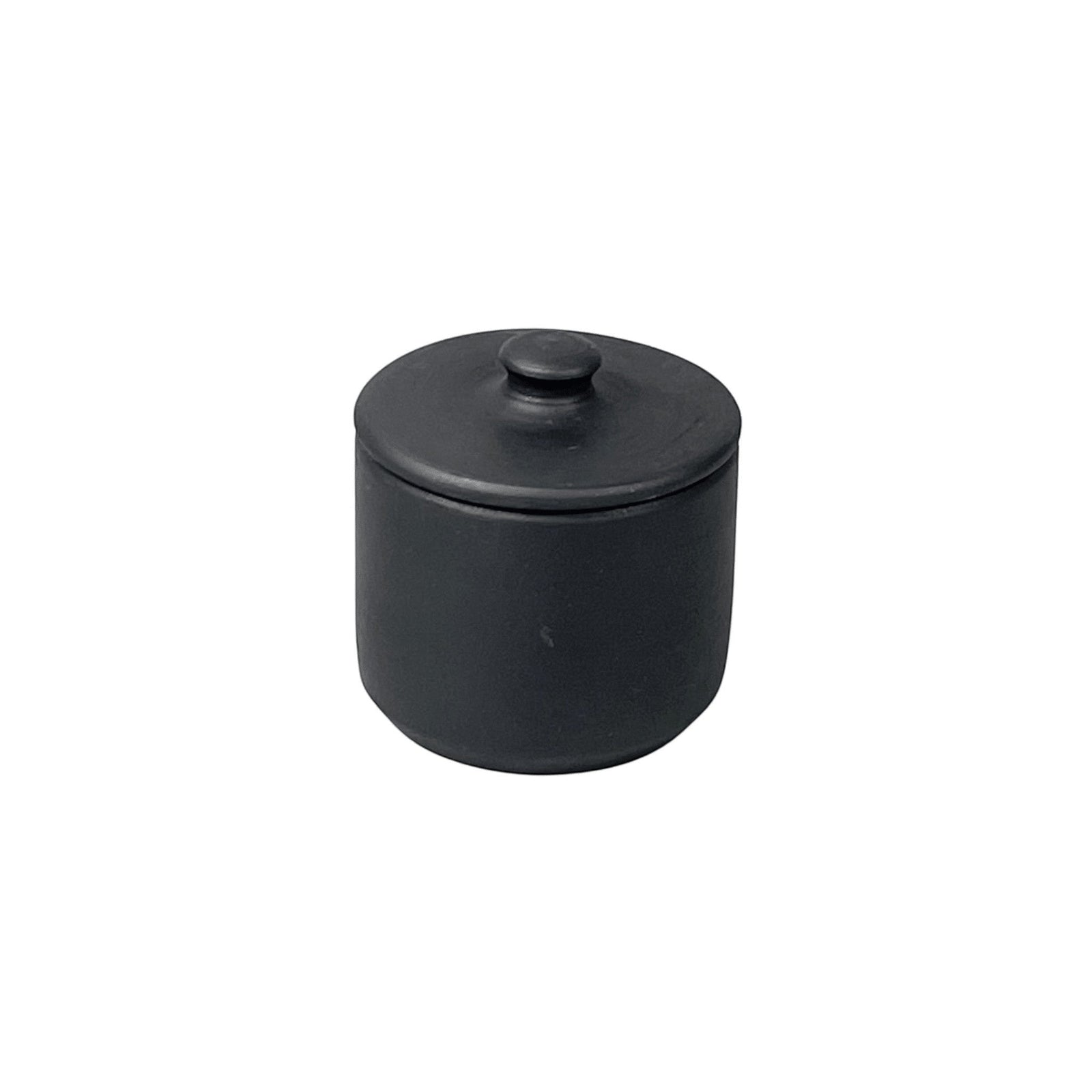 Bitters Co matte black barro clay sugar bowl with a minimalist cylindrical design and matching lid.