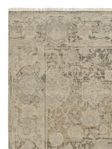 Armadillo Basilica Rug in Clove, corner close-up of the wool pile and edge