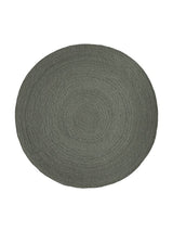 Armadillo Nimbus Rug in Oakmoss, overhead view of the hand-braided new zealand wool weave and edge finish