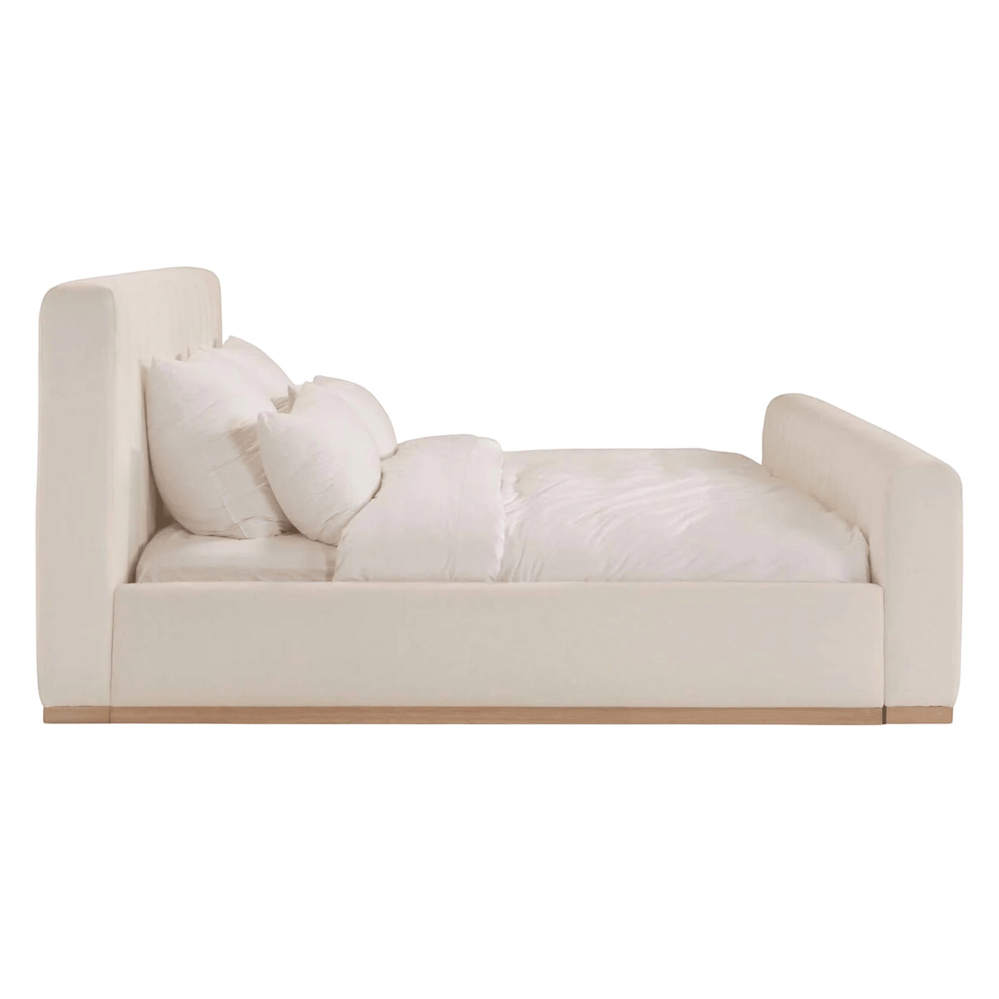 Calimia Home Bennett Bed in cream Belgian linen with vertical channel tufting and a natural oak wood base.