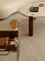 Armadillo Latitude Rug in Beluga, handwoven linen flatweave rug shown in a room setting