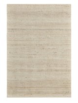 Armadillo Bower Rug in Parsnip, a second view of the hand-knotted afghan wool rug in a styled interior