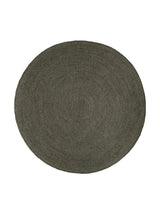 Armadillo Braid Rug in Ivy, overhead view of the hand-braided wool blend weave and edge finish