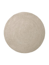 Armadillo Braid Rug in Mushroom, a second view of the hand-braided wool blend rug in a styled interior