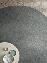 Armadillo Braid Rug in Heron, detail of the wool and viscose blend weave and texture