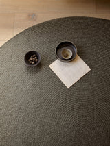 Armadillo Braid Rug in Ivy, detail of the wool and viscose blend weave and texture