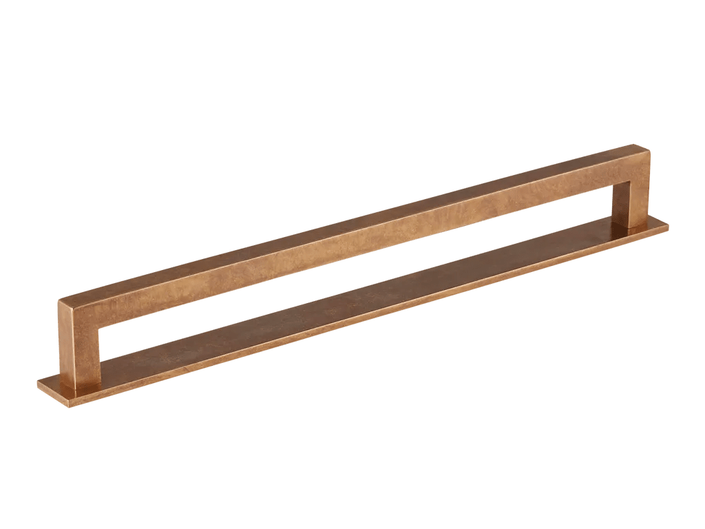 Bronze cabinet handle on a white background
