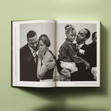 Calimia Home Bruce Weber My Education book open to a spread showing a black and white family portrait in formal dress.