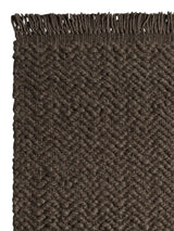 Armadillo Arroyo Rug in Thorn, corner close-up of the felted wool pile and edge