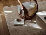 Armadillo Petra Rug in Sparrow, hand-knotted new zealand wool rug shown in a room setting