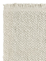 Armadillo Arroyo Rug in Chalk, corner close-up of the felted wool pile and edge