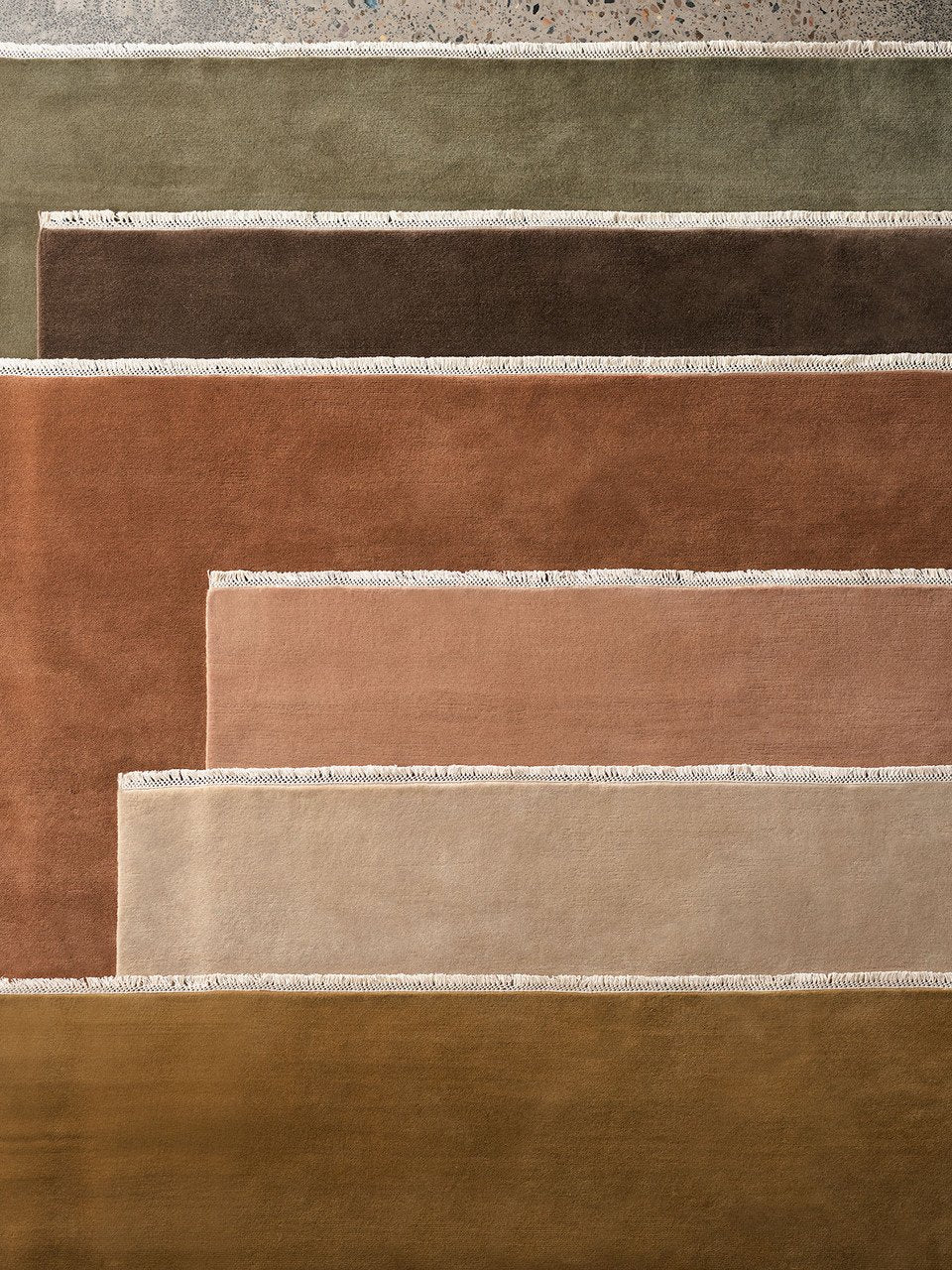 Eden Rug by Armadillo, hand-knotted wool rug, styled in a room at Calimia Home