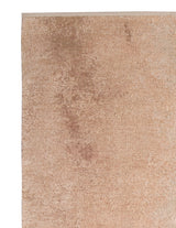 Armadillo Alma Rug in Nectar, corner close-up of the wool and silk pile and edge