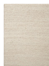 Armadillo Cable Rug in Calico, corner close-up of the italian and argentinian wool pile and edge