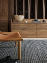 Armadillo Cable Rug in Chambray, a second view of the handwoven soumak wool rug in a styled interior