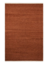 Armadillo Cable Rug in Bisque, overhead view of the handwoven soumak wool weave and edge finish