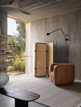 Armadillo Cable Rug in Seed, handwoven soumak wool rug shown in a room setting