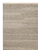 Armadillo Cable Rug in Seed, corner close-up of the italian and argentinian wool pile and edge