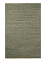 Armadillo Cable Rug in Jade, overhead view of the handwoven soumak wool weave and edge finish