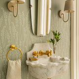 Powder room in Farrow & Ball Feather Grass wallpaper with a carved marble sink, Calimia Home Greenway project