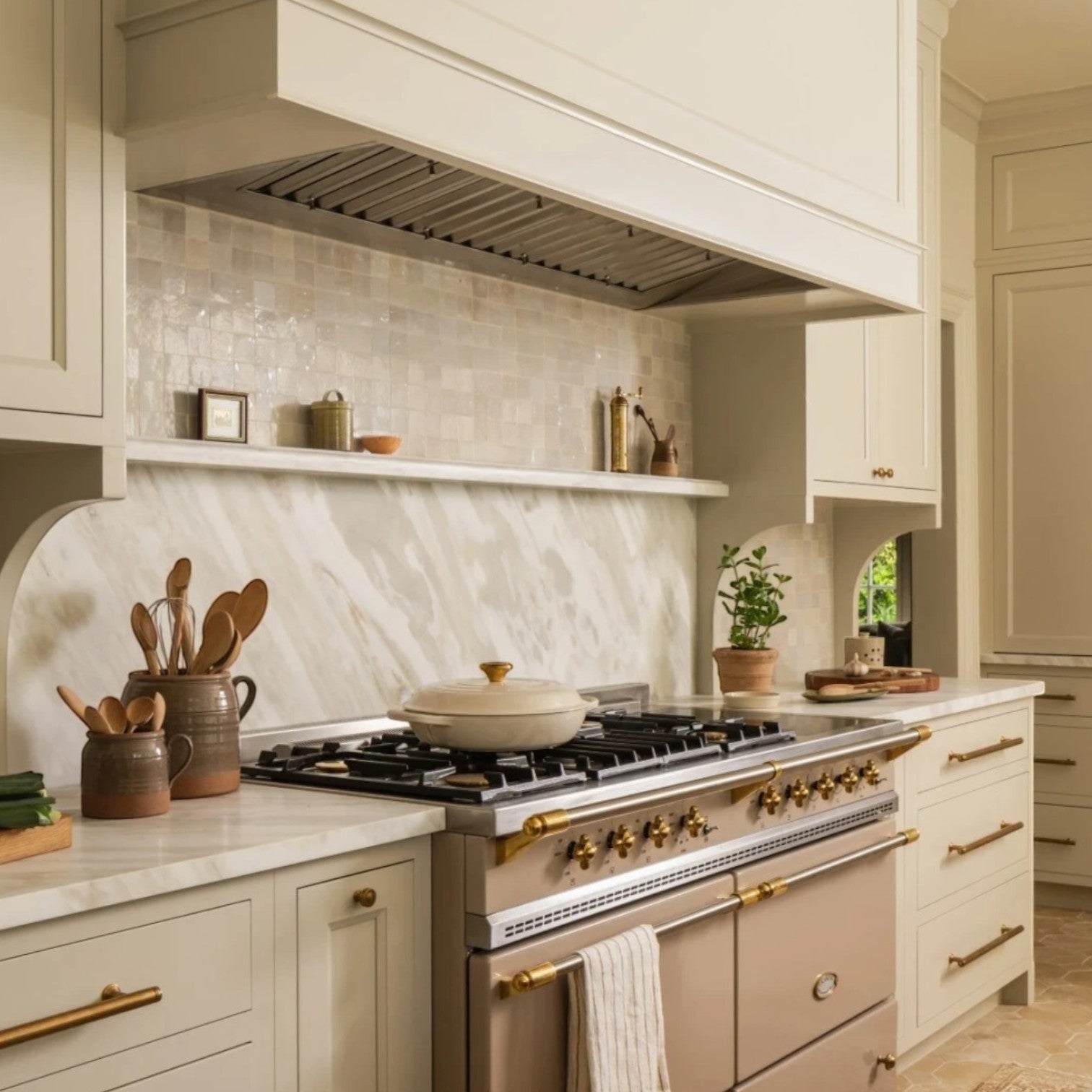 Calimia Home French Country Crock in flax glaze displayed on a marble countertop in a rustic farmhouse kitchen