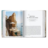 Calimia Home Great Escapes Italy book open to a page featuring a scenic photo of Hotel Il Pellicano in Tuscany
