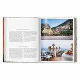 Calimia Home Great Escapes Mediterranean book open to a page featuring a coastal hotel in Positano with scenic photos.